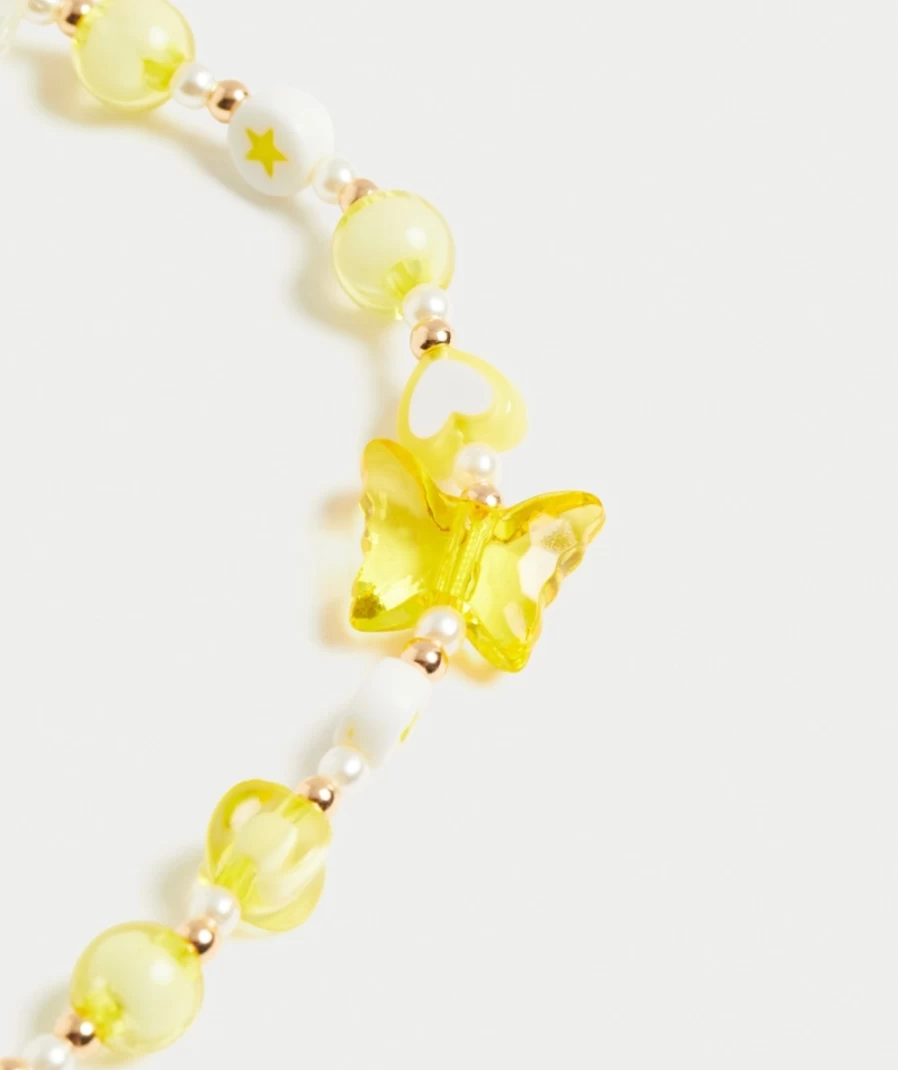 "Sportsgirl Yellow Fairytale Phone Strap for Women - Cute Charm Accessory"